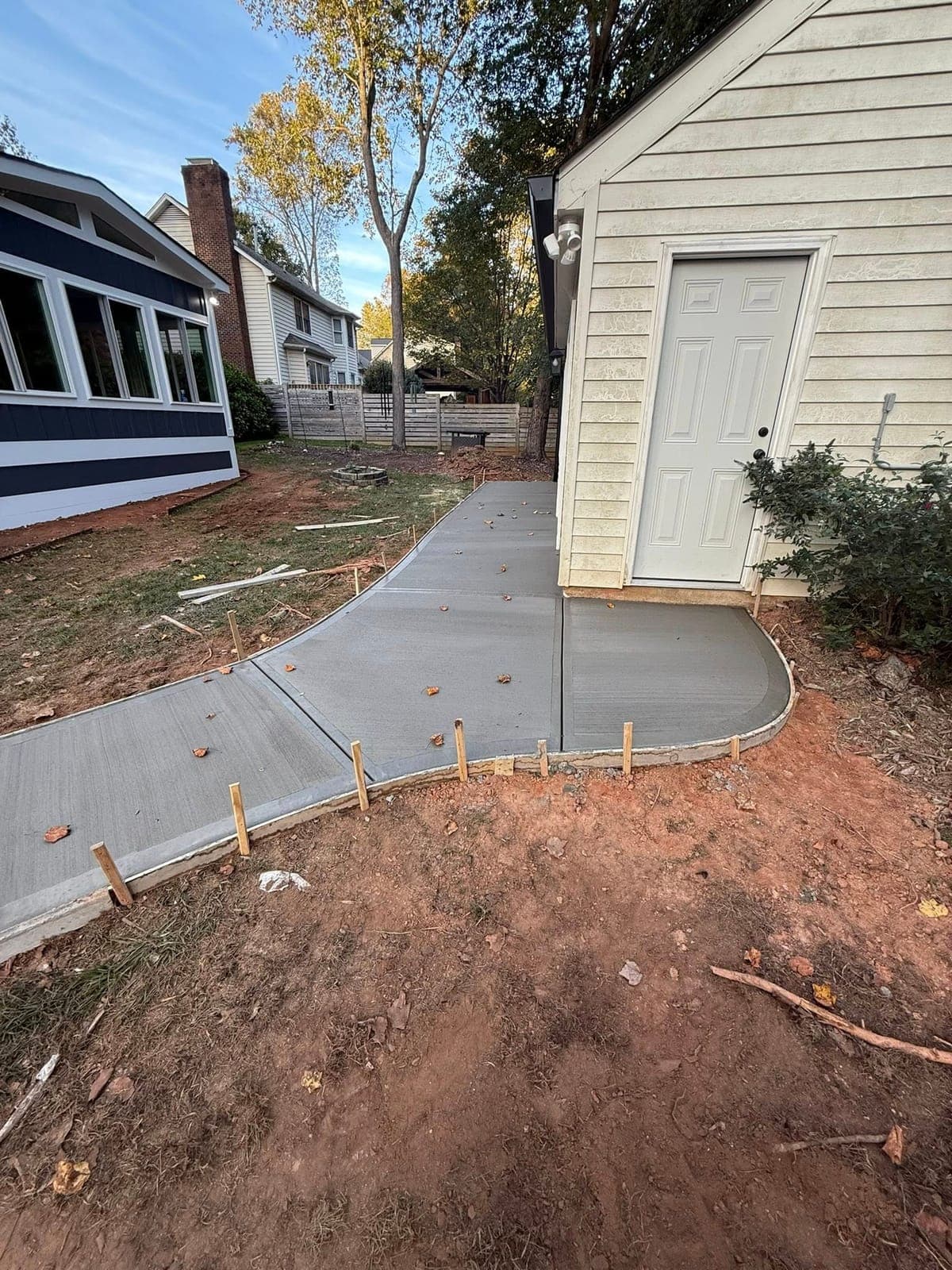 Professional Concrete Walkways installation in Gastonia, North Carolina by Local Concrete Contractor — commercial-grade base prep, 6-inch compacted aggregate, expansion joints sawn within 12 hours.