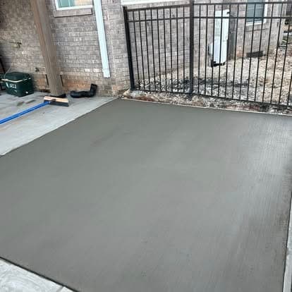 Finished Patio Repair job in Gastonia, North Carolina by Local Concrete Contractor — clean control-joint pattern, smooth troweled surface, full property protection during pour.