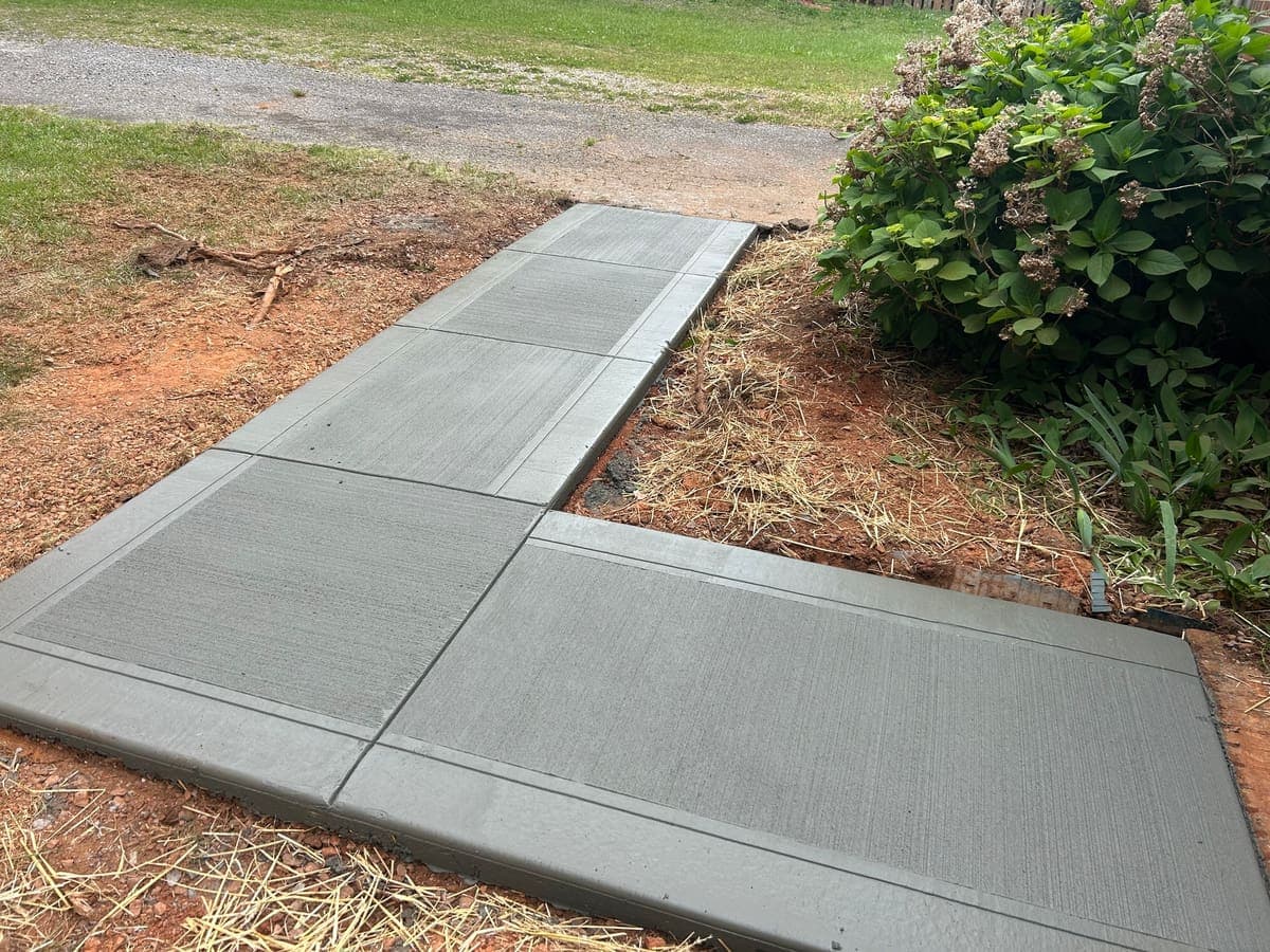 Local Concrete Contractor Sidewalk Repair project in Gastonia, North Carolina (Gaston County) — 4000 PSI commercial-grade concrete, expansion joints, professional broom or smooth finish.