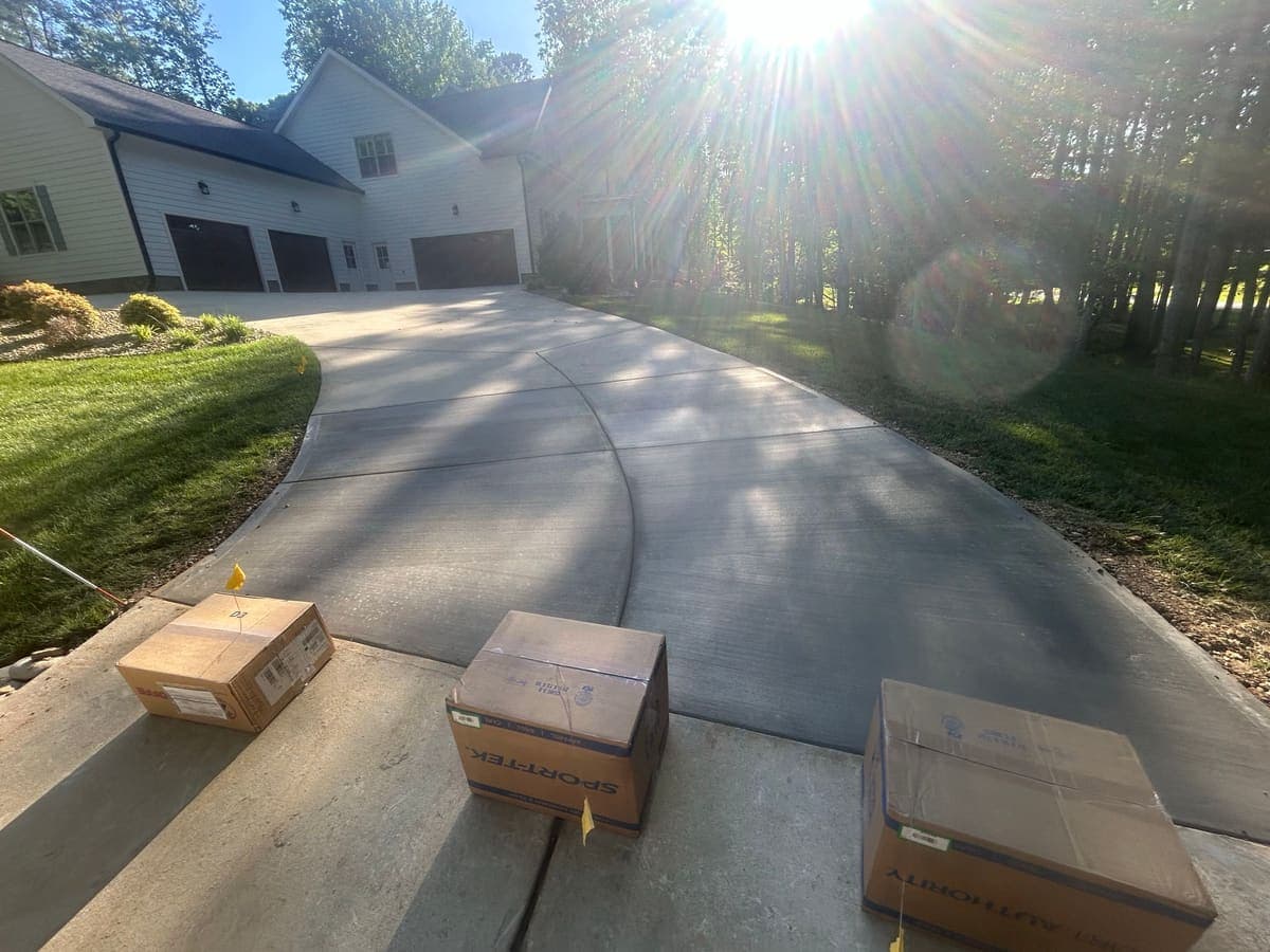 Professional Concrete Driveway Repair installation in Mint Hill, North Carolina by Local Concrete Contractor — commercial-grade base prep, 6-inch compacted aggregate, expansion joints sawn within 12 hours.